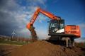 Колёсный экскаватор Hitachi ZX140W с оператором