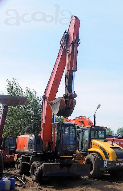 Колёсный экскаватор Hitachi ZX210W