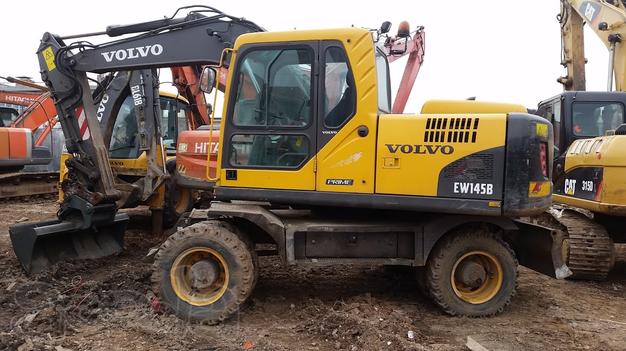 Колёсный экскаватор Volvo EW145