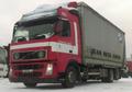 Грузовик шторный тентованый  Volvo FH12.420