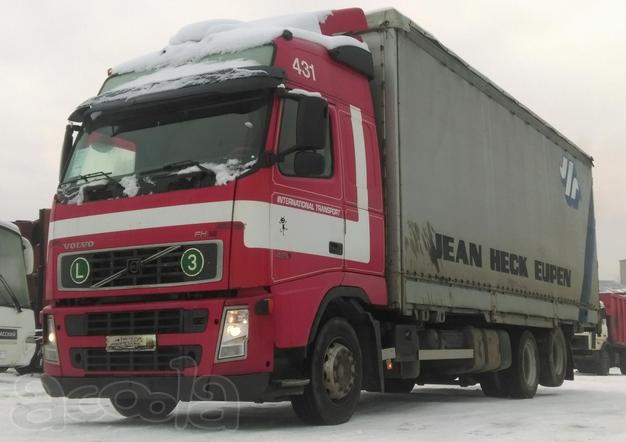 Грузовик шторный тентованый  Volvo FH12.420