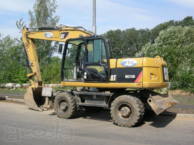 Колёсный экскаватор CAT M315D в аренду