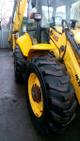 Продам экскаватор-погрузчик New Holland B115