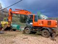 Аренда колёсного экскаватора HITACHI 180
