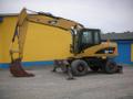 Колёсный экскаватор Cat 313