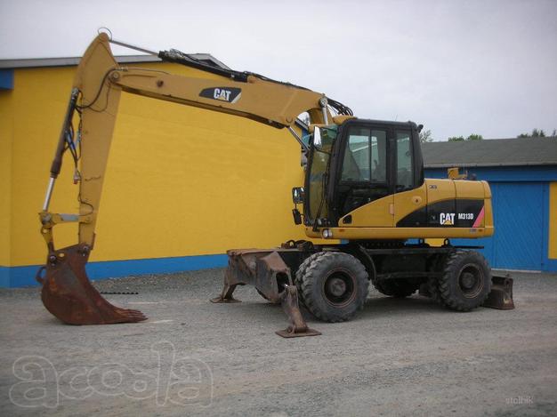Колёсный экскаватор Cat 313