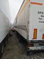 Полуприцеп бортовой шторный Krone SD.
