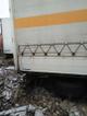Полуприцеп бортовой шторный Krone SD.