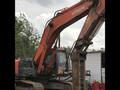 Сдам в аренду Экскаватор с гидромолотом Hitachi 330