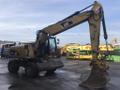 Аренда колёсного экскаватора Caterpillar