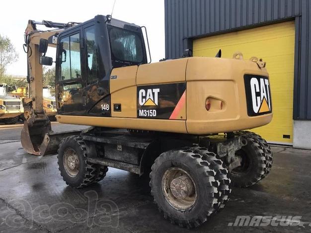Экскаватор колёсный caterpillar 315