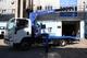 Эвакуатор с ломаной платформой на базе ISUZU ELF 7.5 (NPR75L) с КМУ